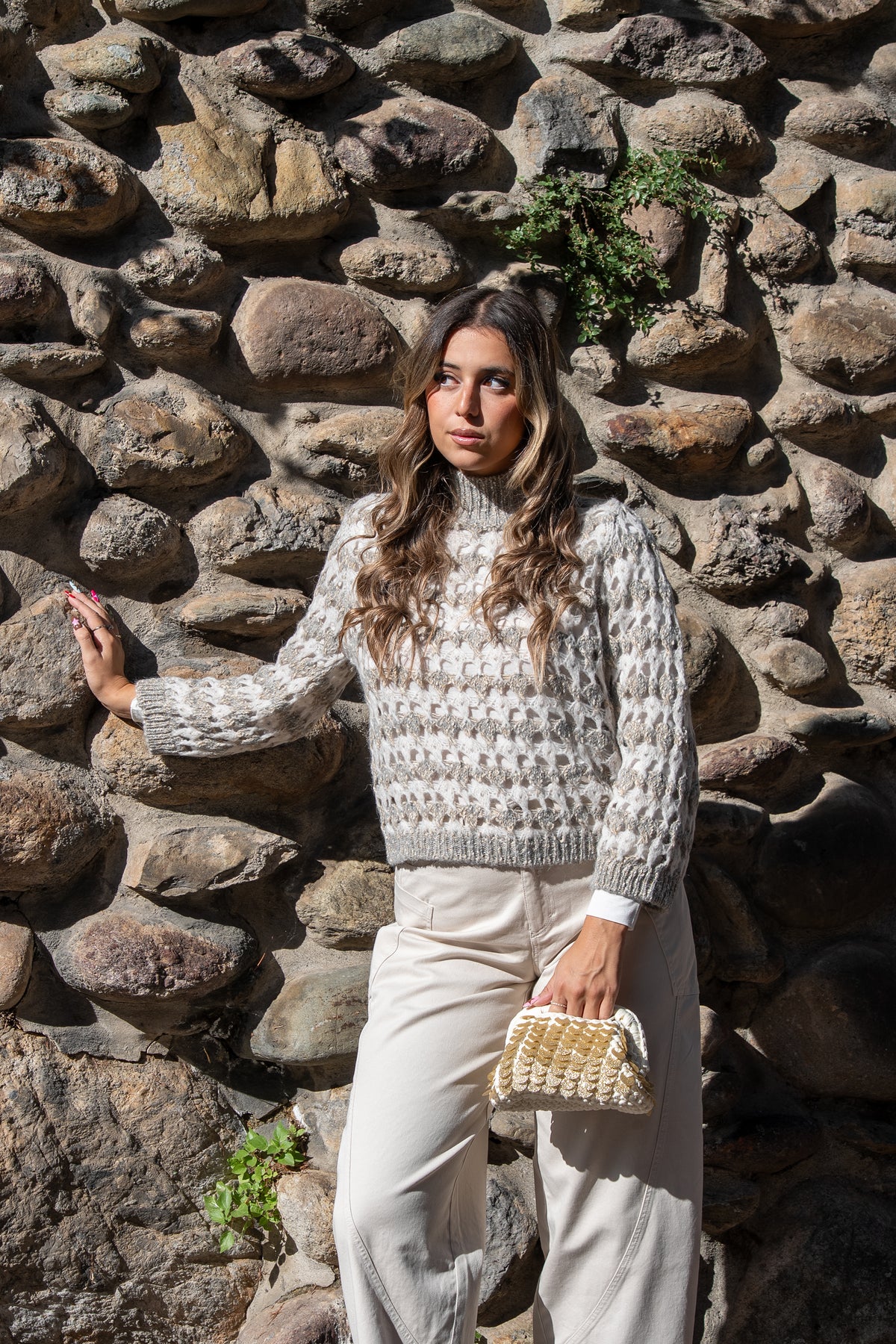 Maglione traforato panna e grigio