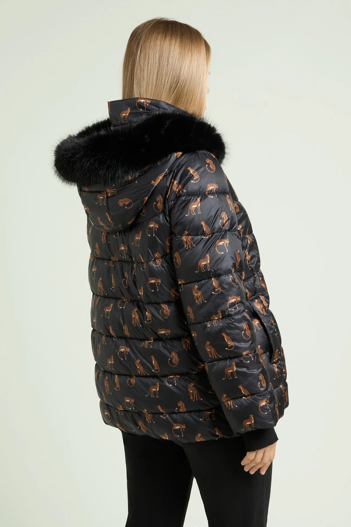 Piumino reversibile con stampa animalier