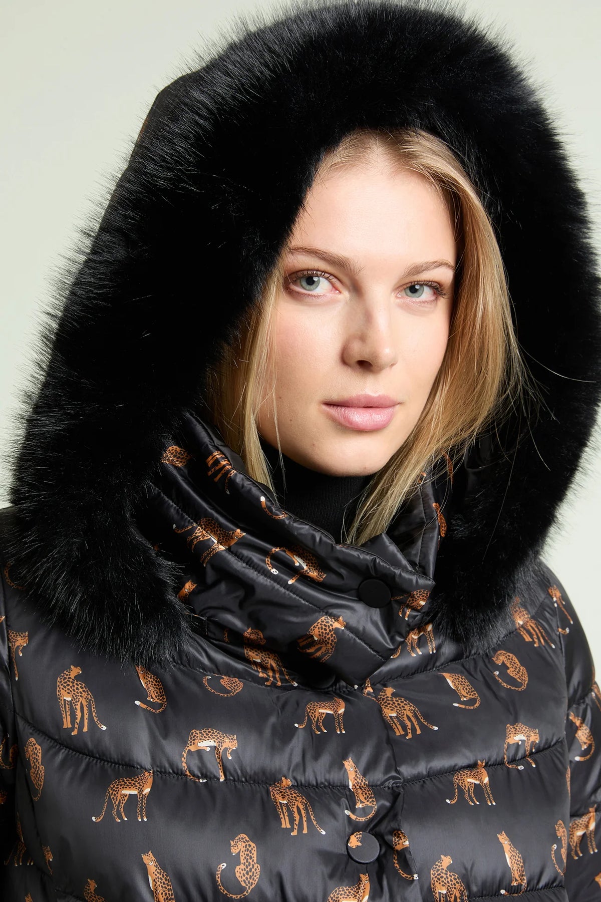 Piumino reversibile con stampa animalier